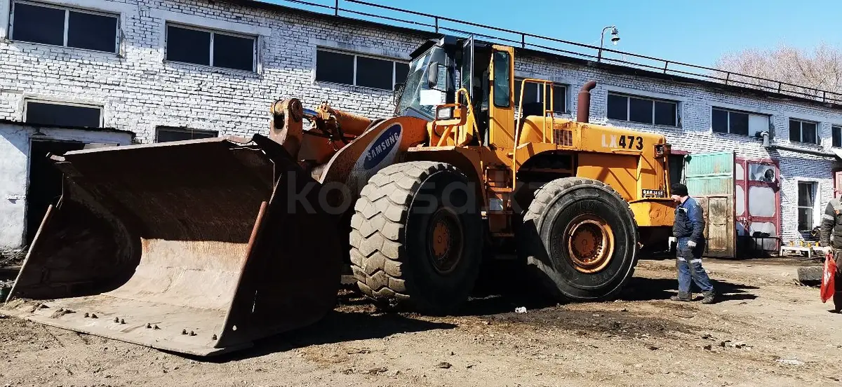 Фронтальный погрузчик, ёмкость ковша 5 м3